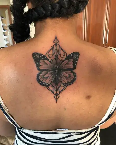 Lil Butterfly and Pinstripe Tattoo on Back