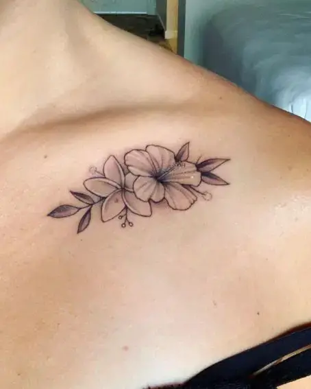 Plumeria Tattoo on Collarbone