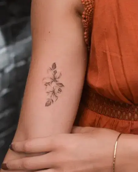 Plumerias Flowers Tattoo on Inner Arm