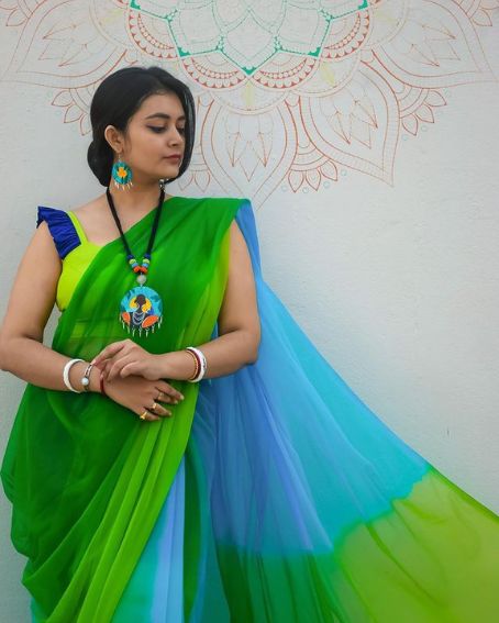 Blue Color Frill Designer Blouse With Green Saree