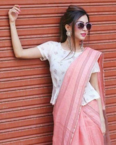 Floral White Color Peplum Blouse Design With Pink Saree