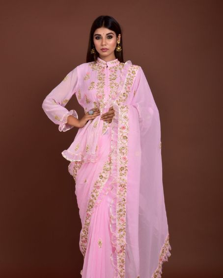 Pink Color Georgette Saree with Peplum Blouse Design