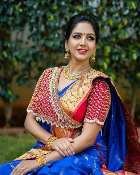 Red Color Asymmetric Overlap Blouse with Blue Saree