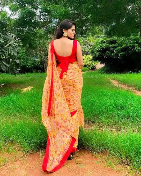 Red Color Bow Sleeveless Blouse Design With Yellow floral saree