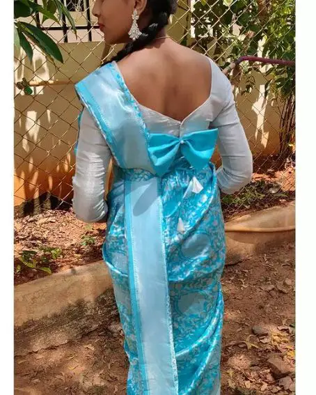 Silver Color Bow Blouse Design With Sky Blue Saree
