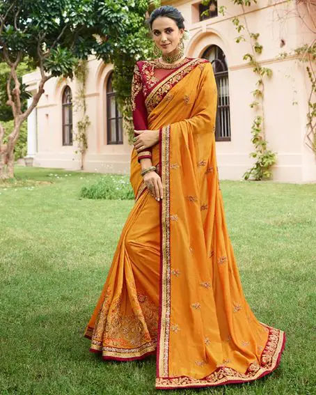 Unique Mustard Yellow Colored Partywear Embroidered Cotton Silk Saree