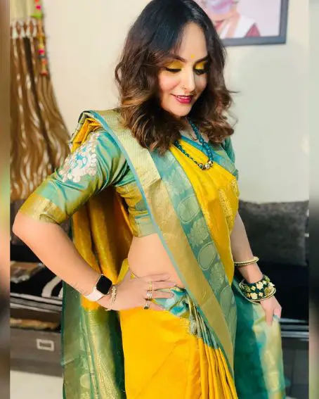 Yellow Fancy Saree With Green Blouse