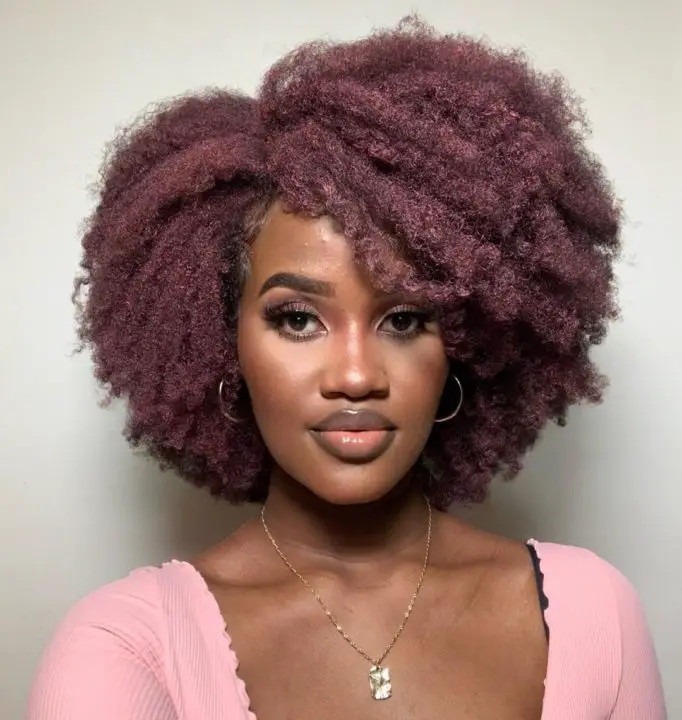 pink curly afro hairstyle